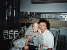 Ethan and his aunt after his first brain surgery